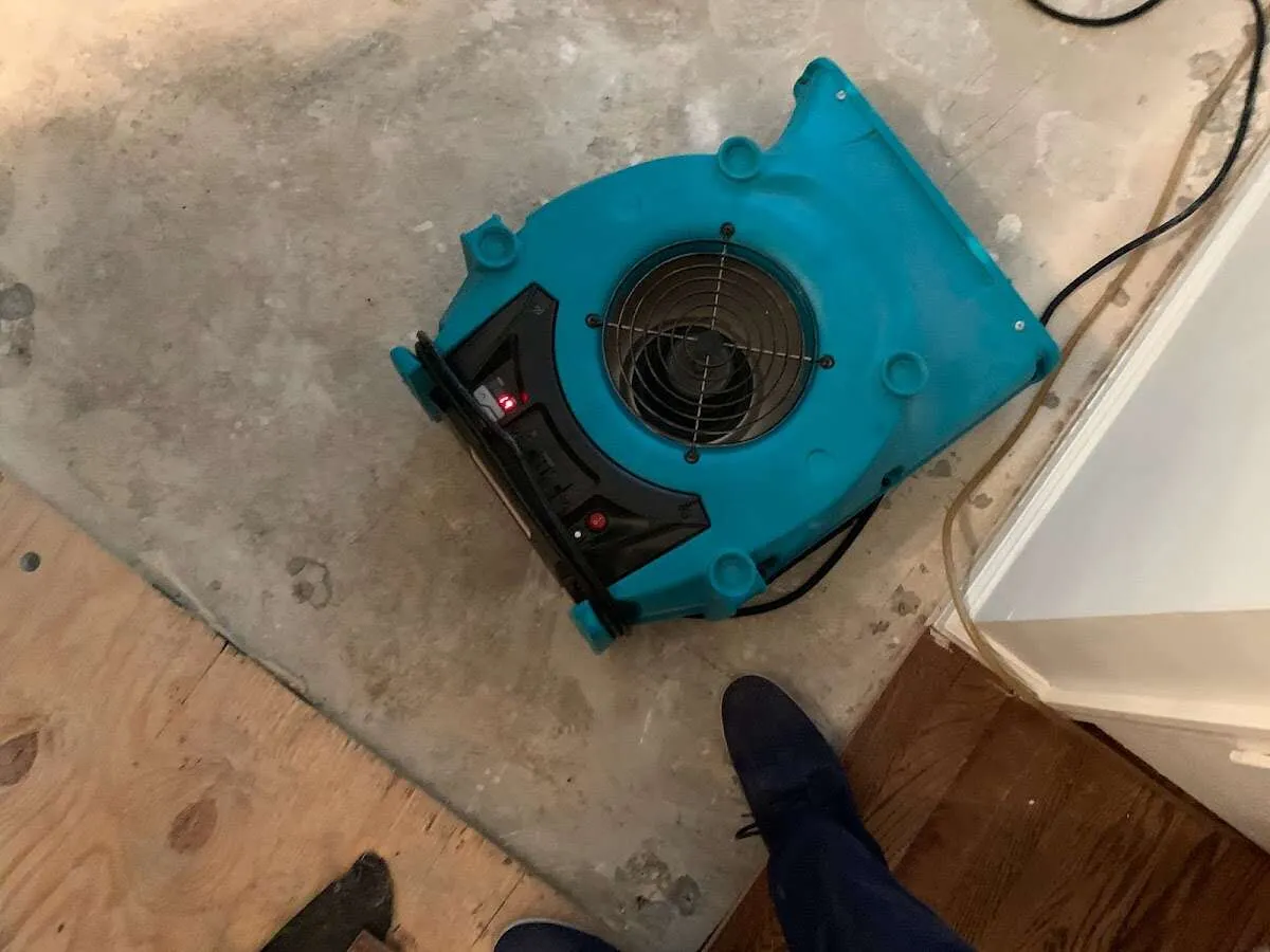 Air mover drying subfloor during Leak Detection & Repair in Orange Park